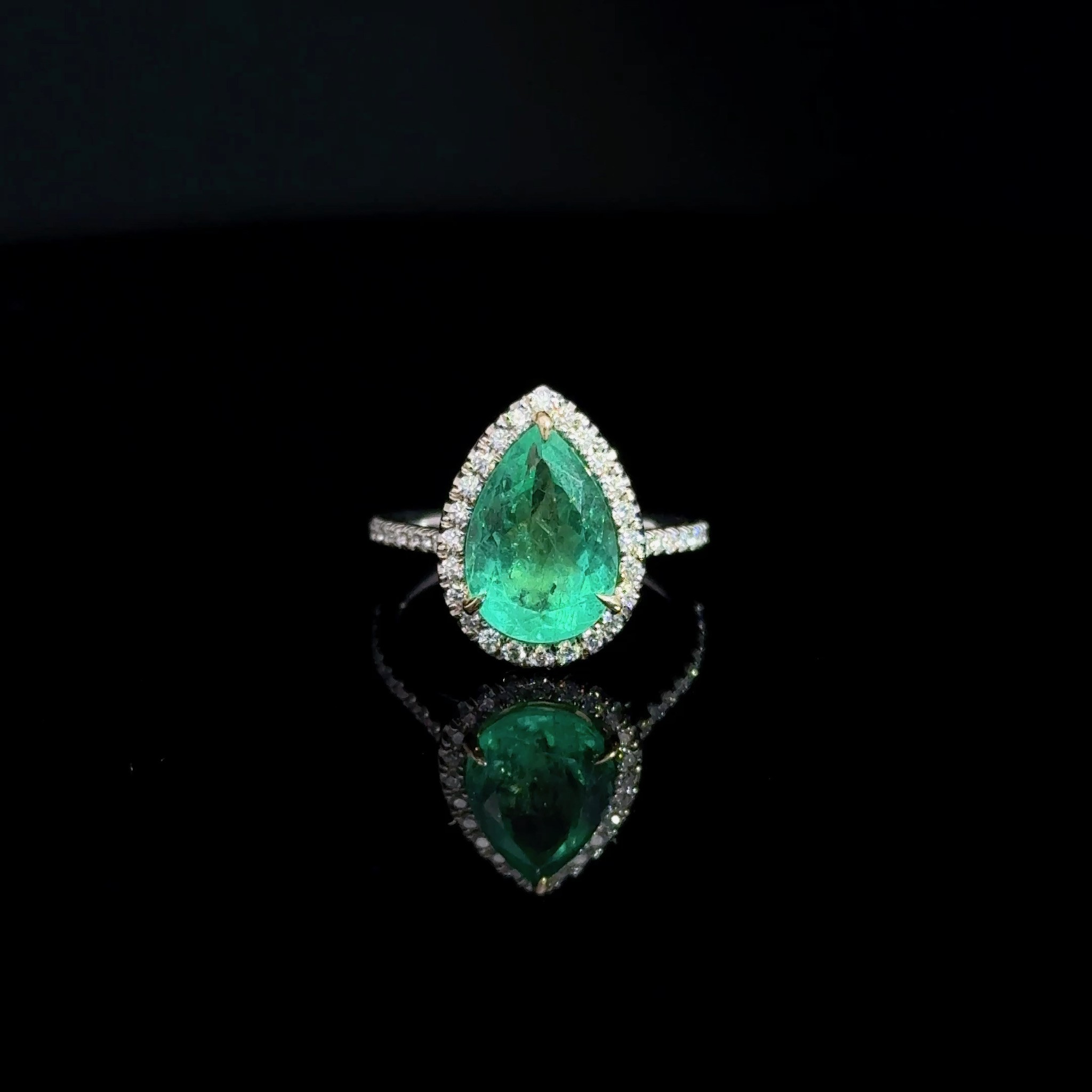 Pear Shape Halo Emerald Ring